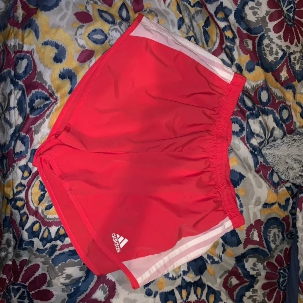 Pink adidas running shorts